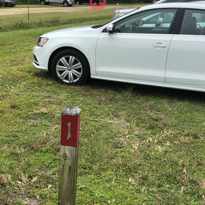 Hole one blocked by soccer parking.