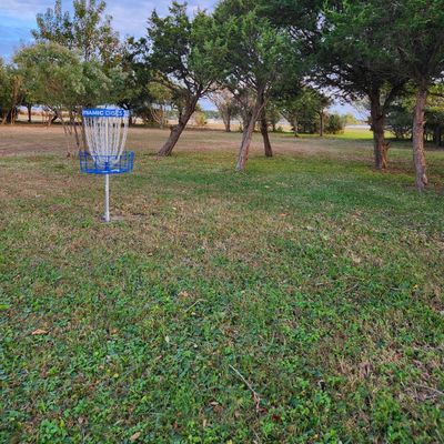 Island hole! Disc must land within railroad ties surrounding the basket. Drop zone is on the floating dock! Shares basket with hole 5.