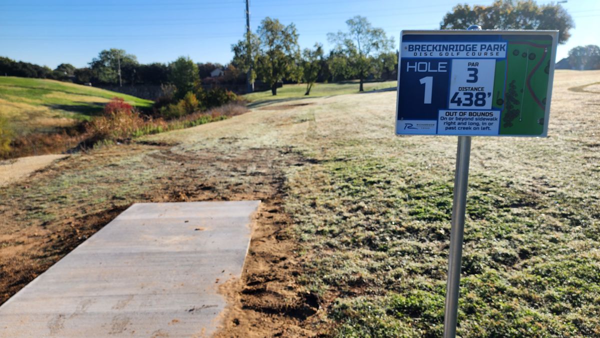 Tee signs going up.