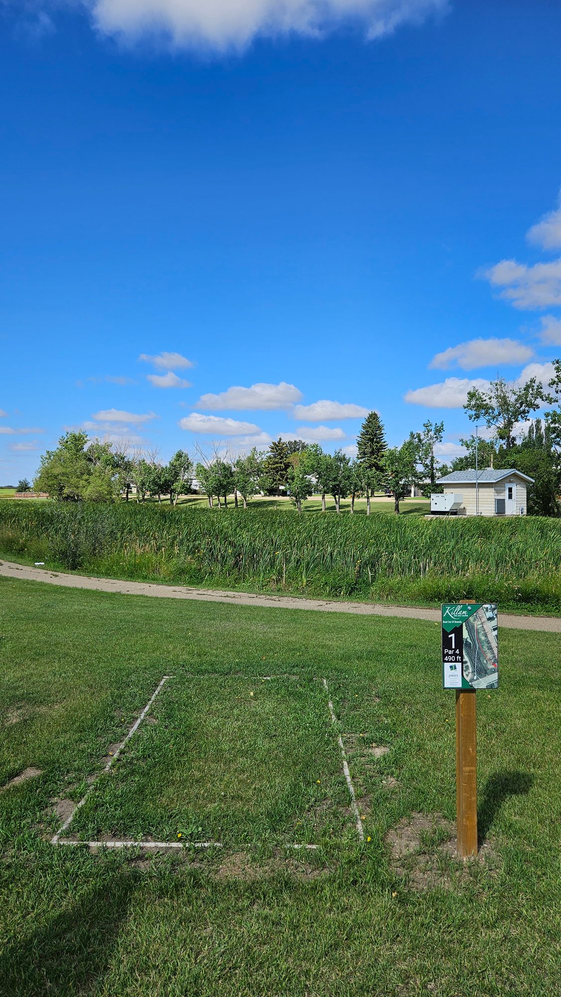 Hole 1 White Tees looking across water