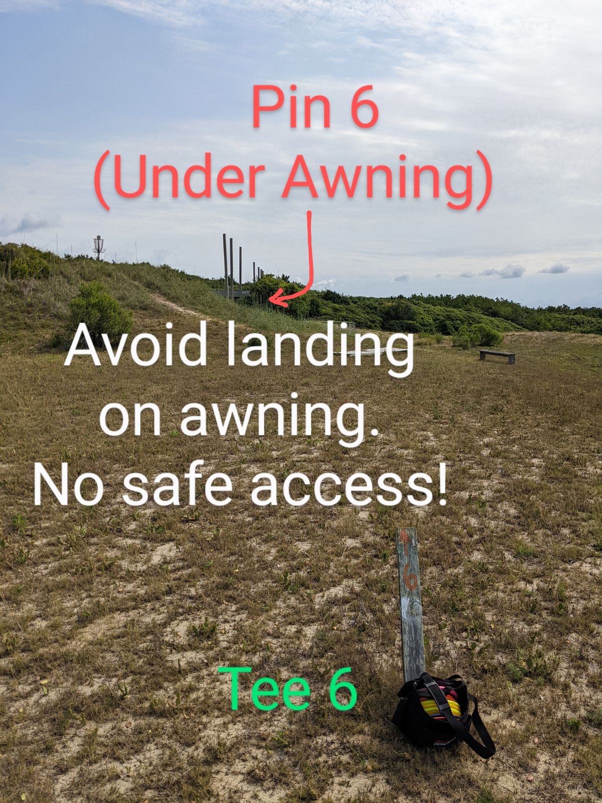 There is a large awning over hole 6. If you land on top of it, you either have to climb or give up your disc.
