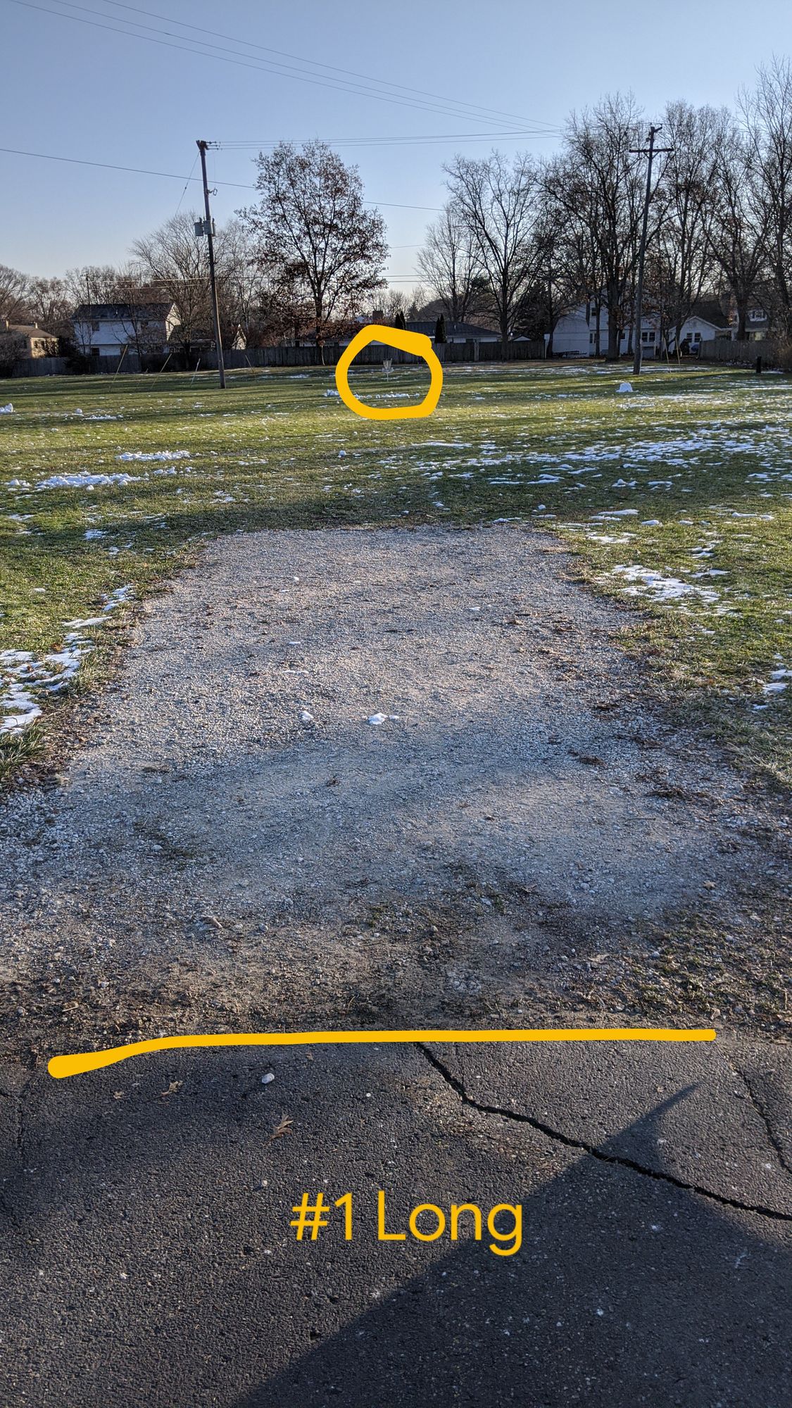 #1 Long Tee - Parking lot to basket beneath power lines.