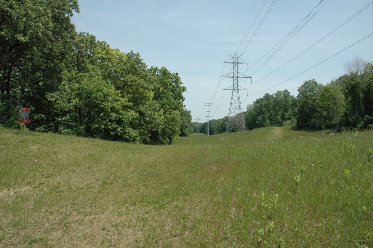 Slightly beyond Hole 8, on pathway to next tee, looking back for wide view of meadow hole occupies