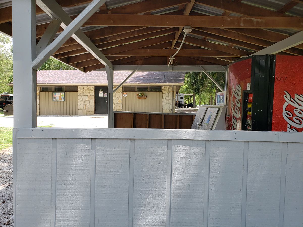 Campground restrooms building and vending area by #6 playground area.