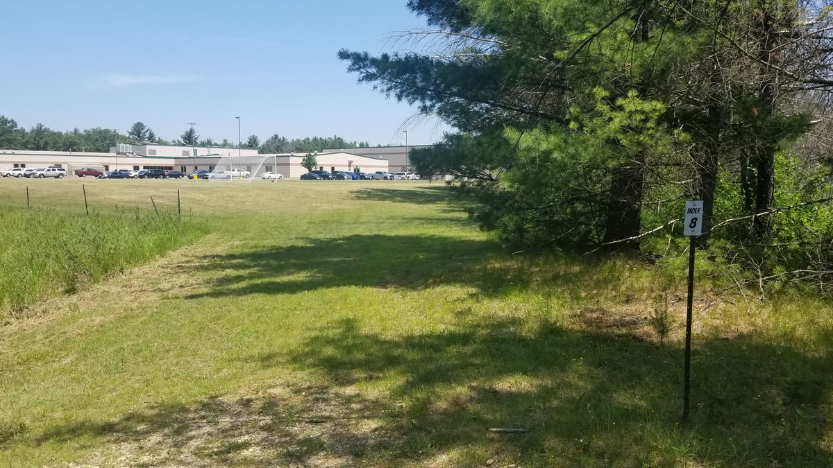 Hole 8. Basket is on right side, hidden from tee pad.