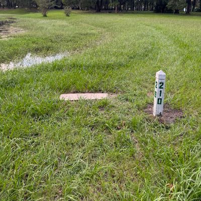 Short position.  Also, the drop zone for shots that never cross in bounds from the long pad.