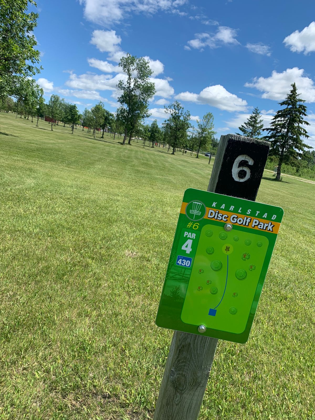 View of hole 6 tee sign & fairway.