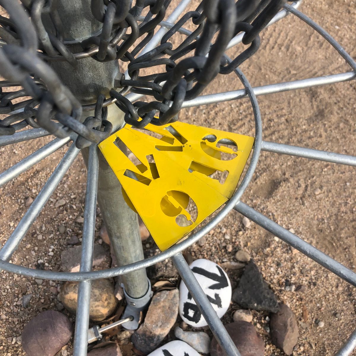 Follow the arrow to tee pad 9 or 16