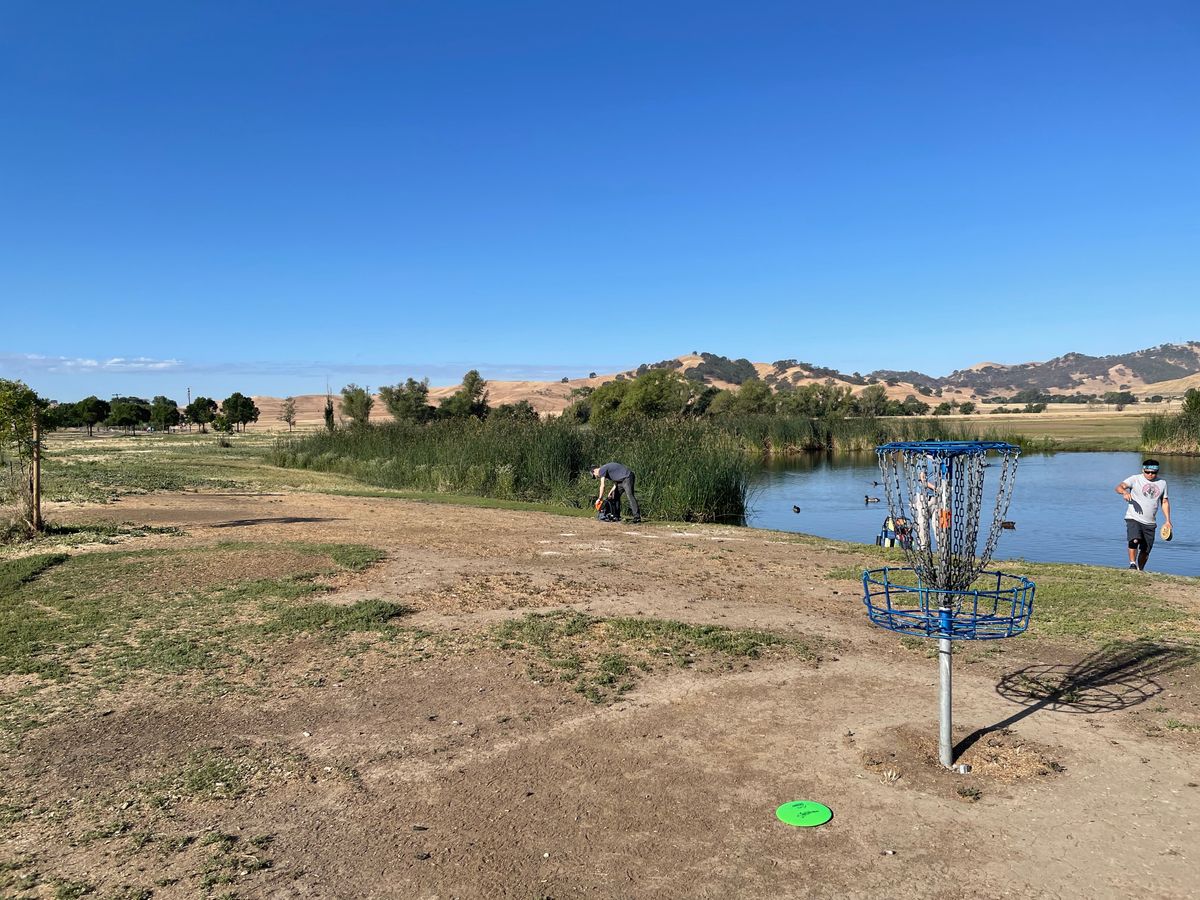 Looking back over the pond fr. the hole 6 basket.  We heard chains bang loudly and ran to see it out