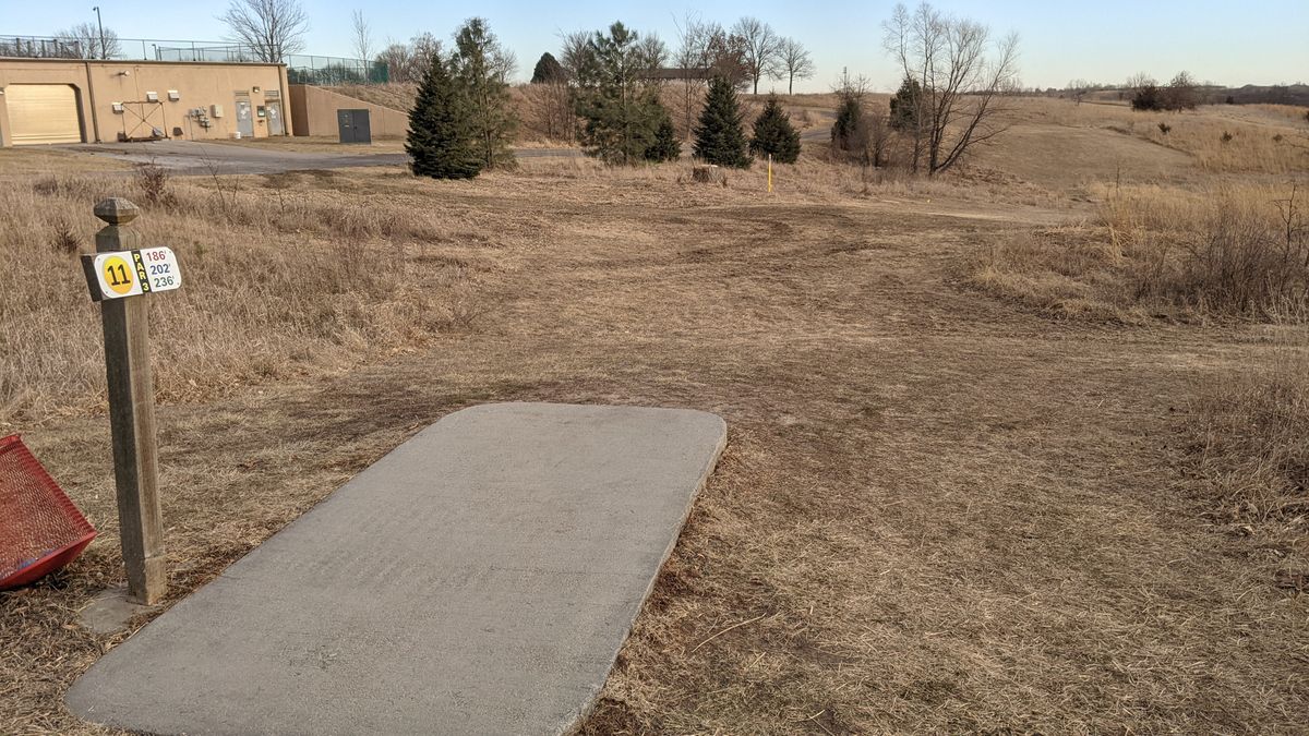Tee #11 basket up on the hill