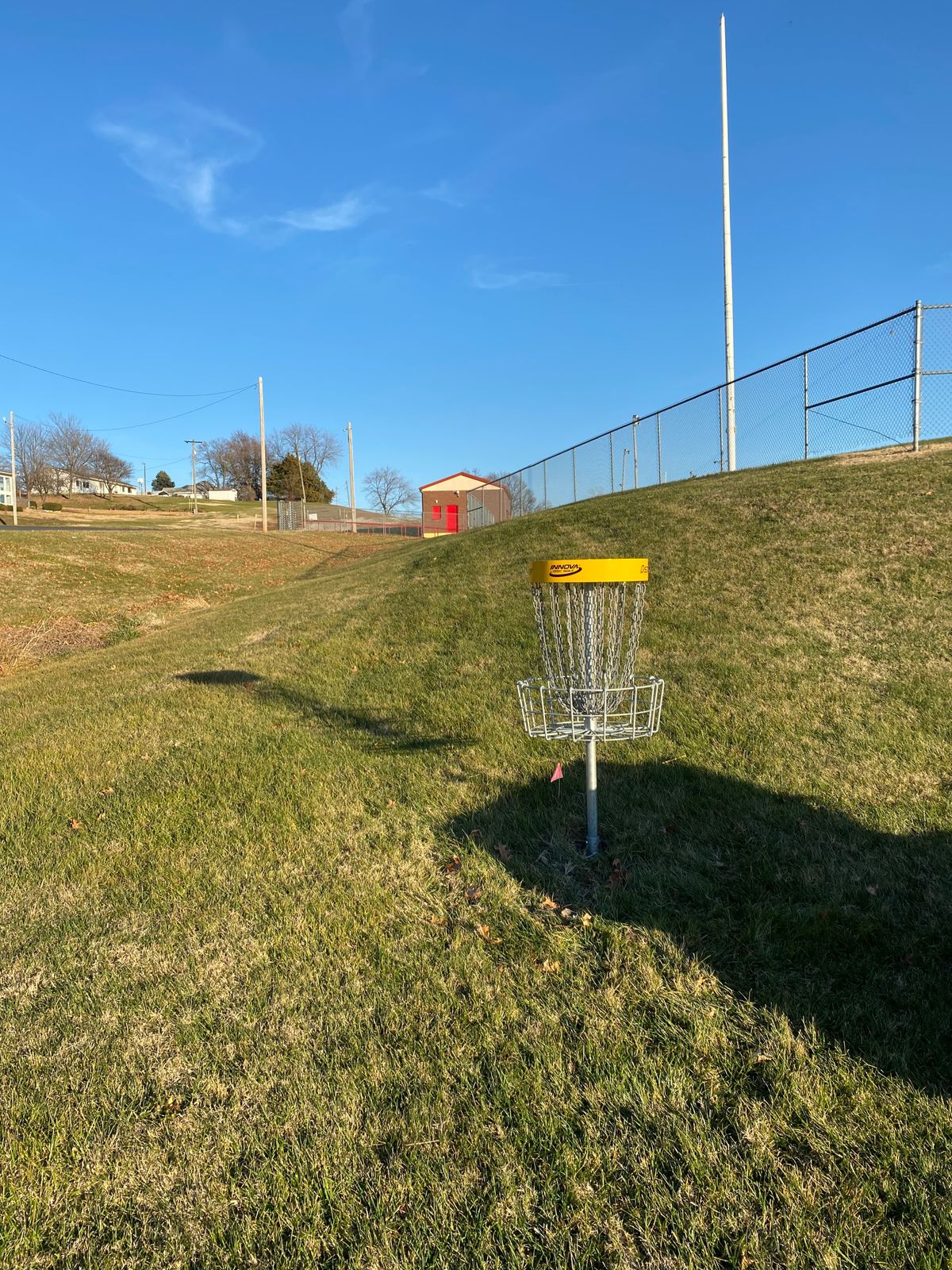 Hole 1 Basket to White Tee