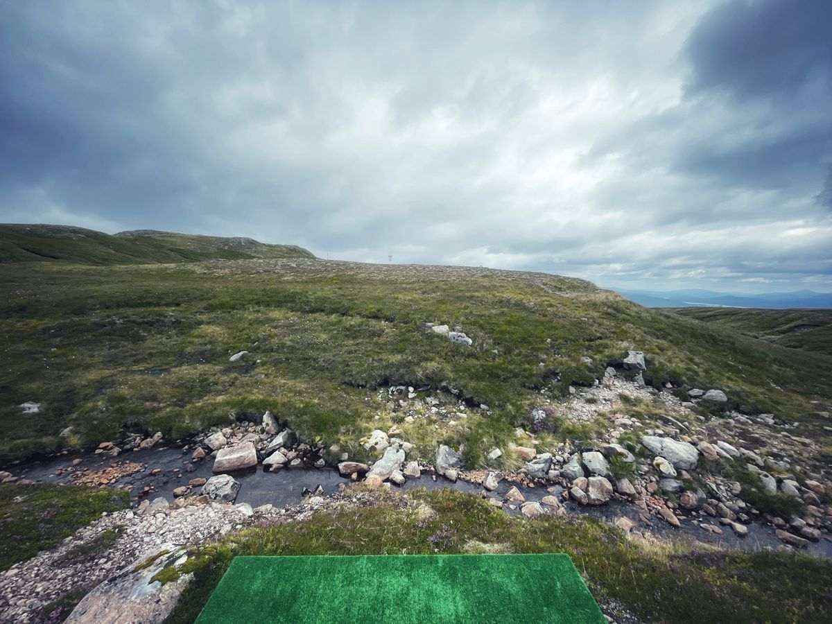 Elevated tee box over the burn (the stream) to hole 2