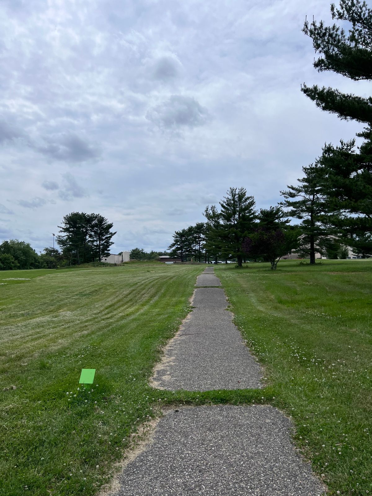 Hole 18 tee. Bunkers/sand traps play as hazard, penalty stroke and play from where it lies.