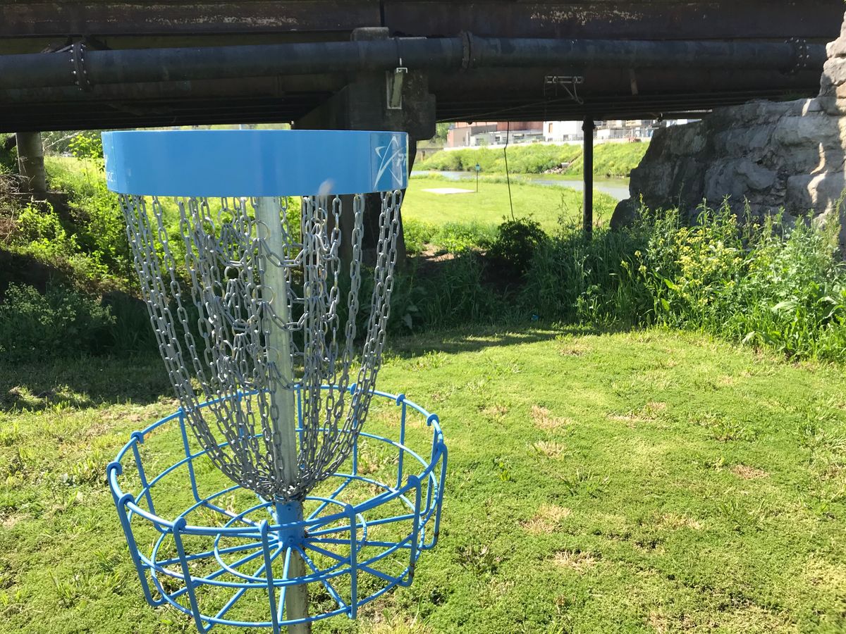 No. 17 basket looking at next tee pad. Can go under bridge or over road.
