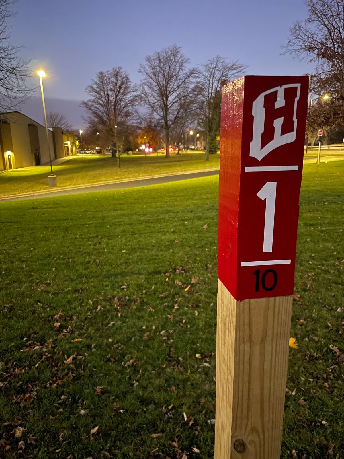 Red tee pad for hole 1 (or hole 10 for 18 hole layout)