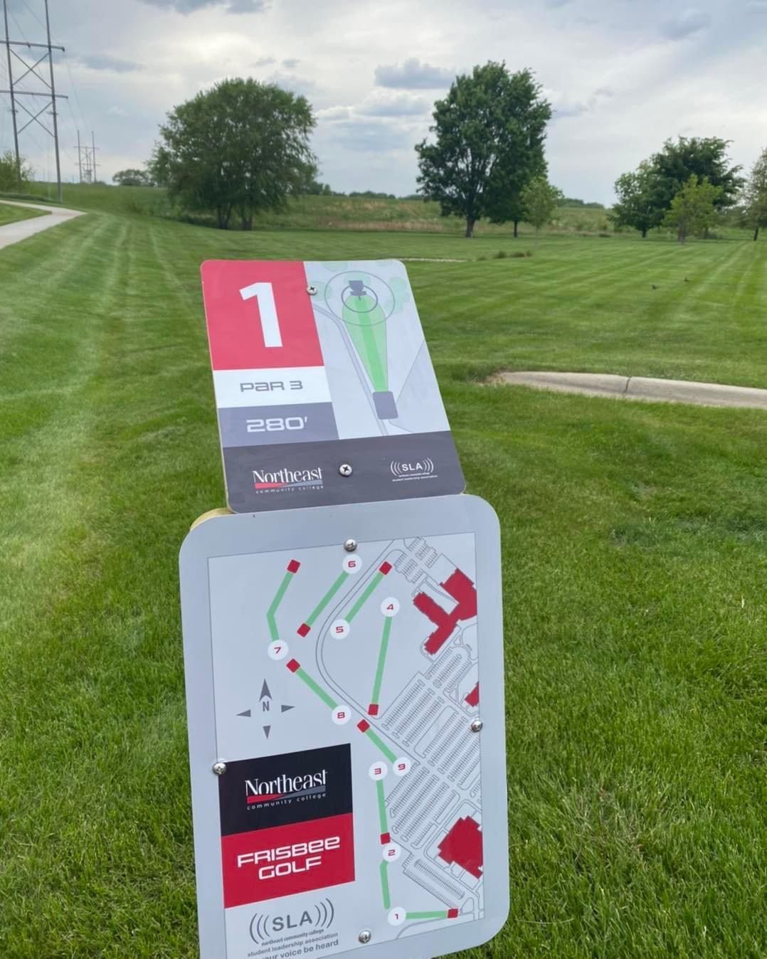 Hole 1 tee and course map. Yes it says Frisbee Golf!
