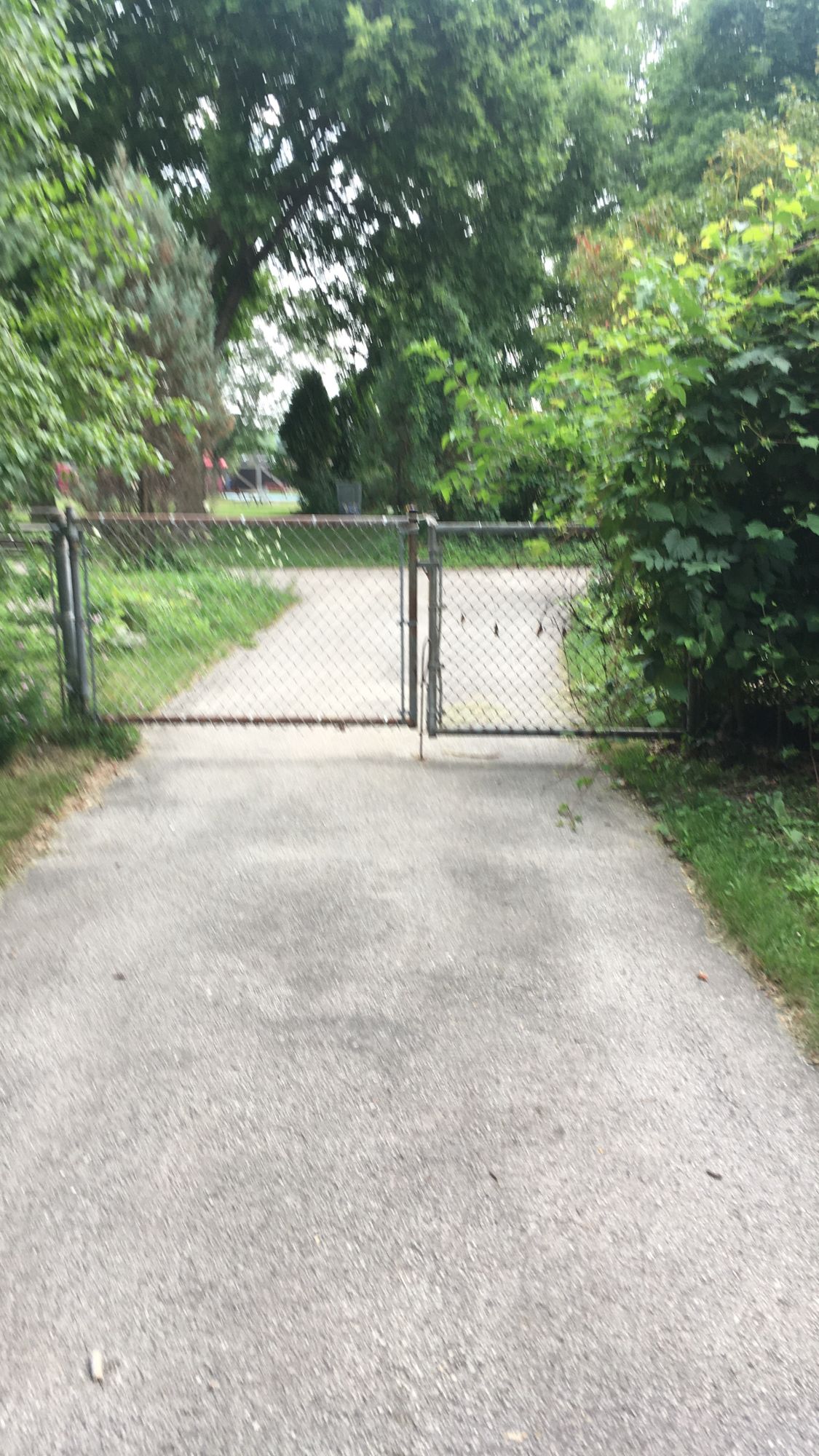 Enter thru this gate on side of building