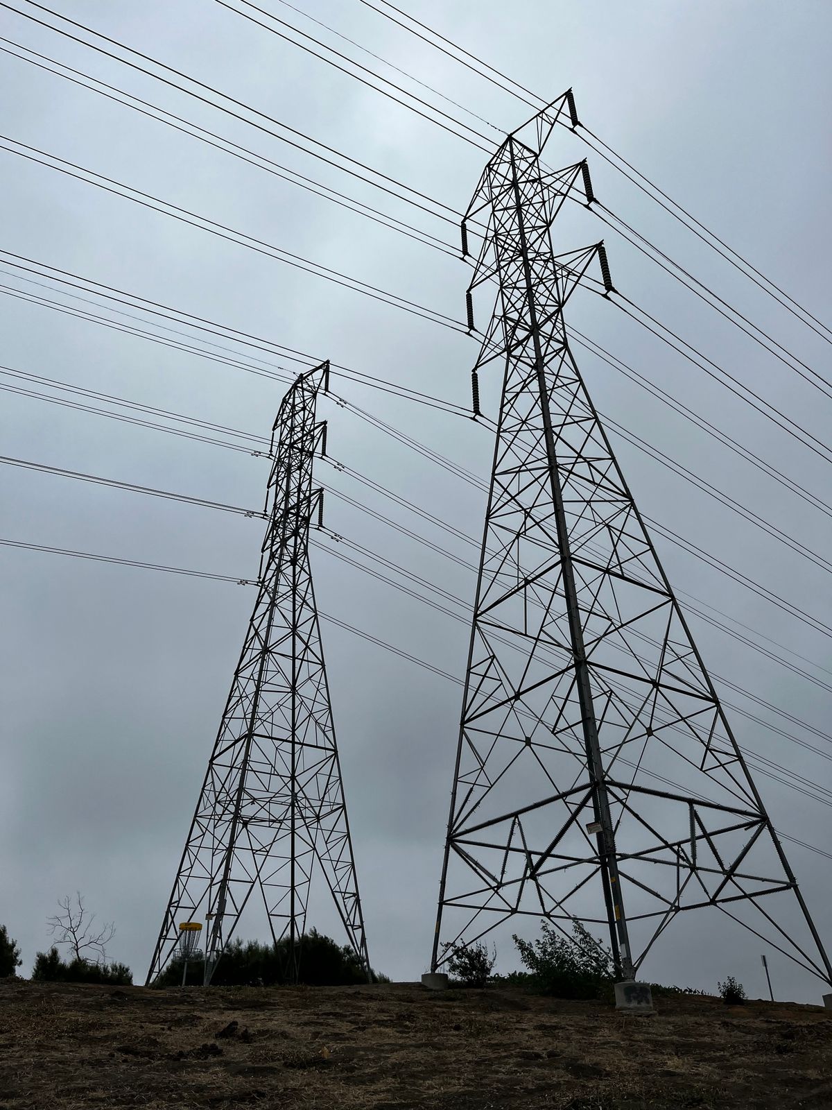 Power lines under cloudy skies ☁️