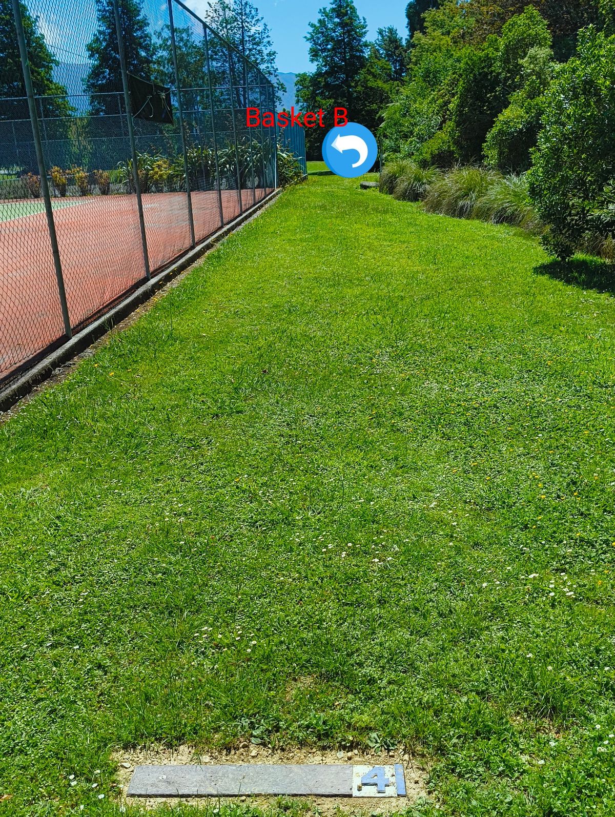 T4 past two tennis courts to Basket B. Please watch out for people playing tennis if your shots tend to rise!