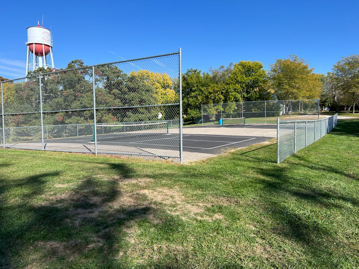 Pickle ball court is done. Backstop fences installed.