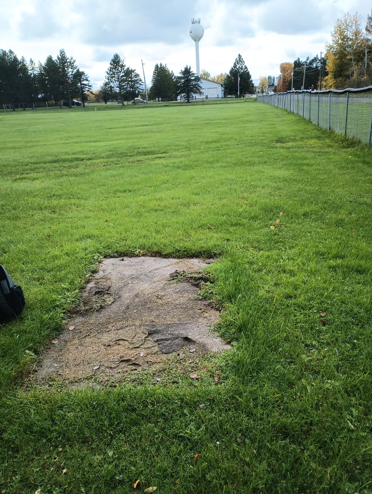 Hole five tee. Basket is straight ahead.