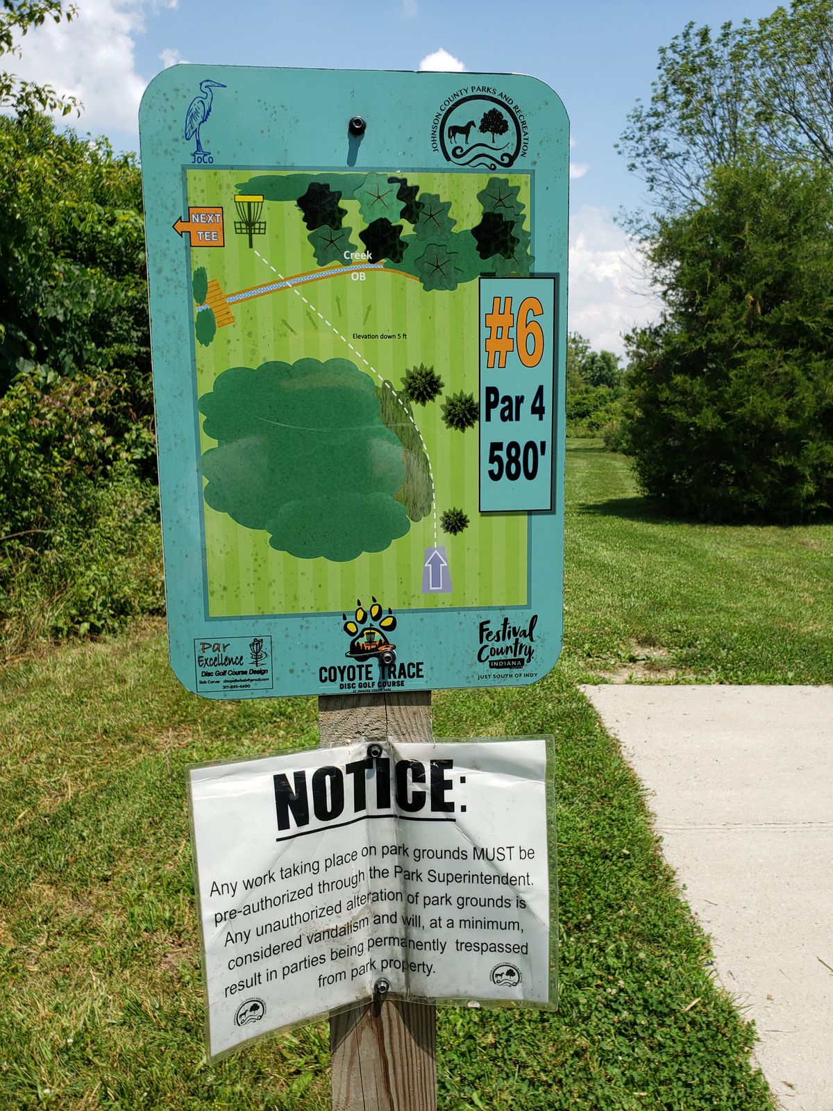 #6 Tee-Pad sign closeup.