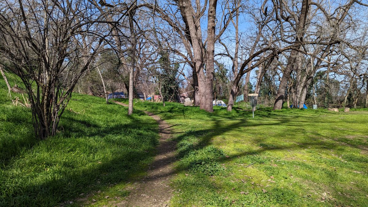Homeless camps all along the course. Front 9 in the trees. Back 9 is open