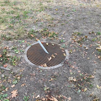This grate is where the marker for the tee of hole nine is.