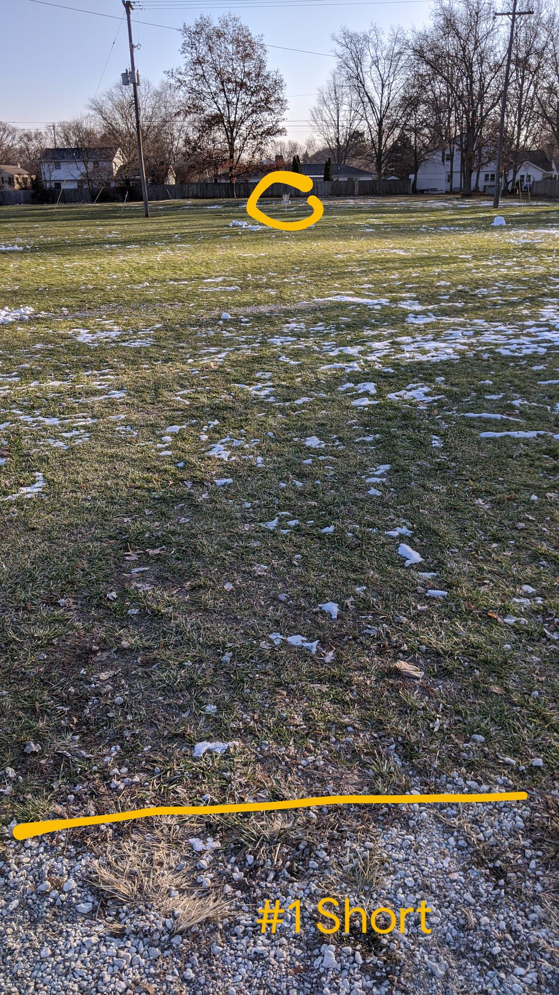 #1 Short Tee - End of gravel path to basket beneath power lines.