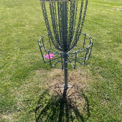 Putting basket before hole one.