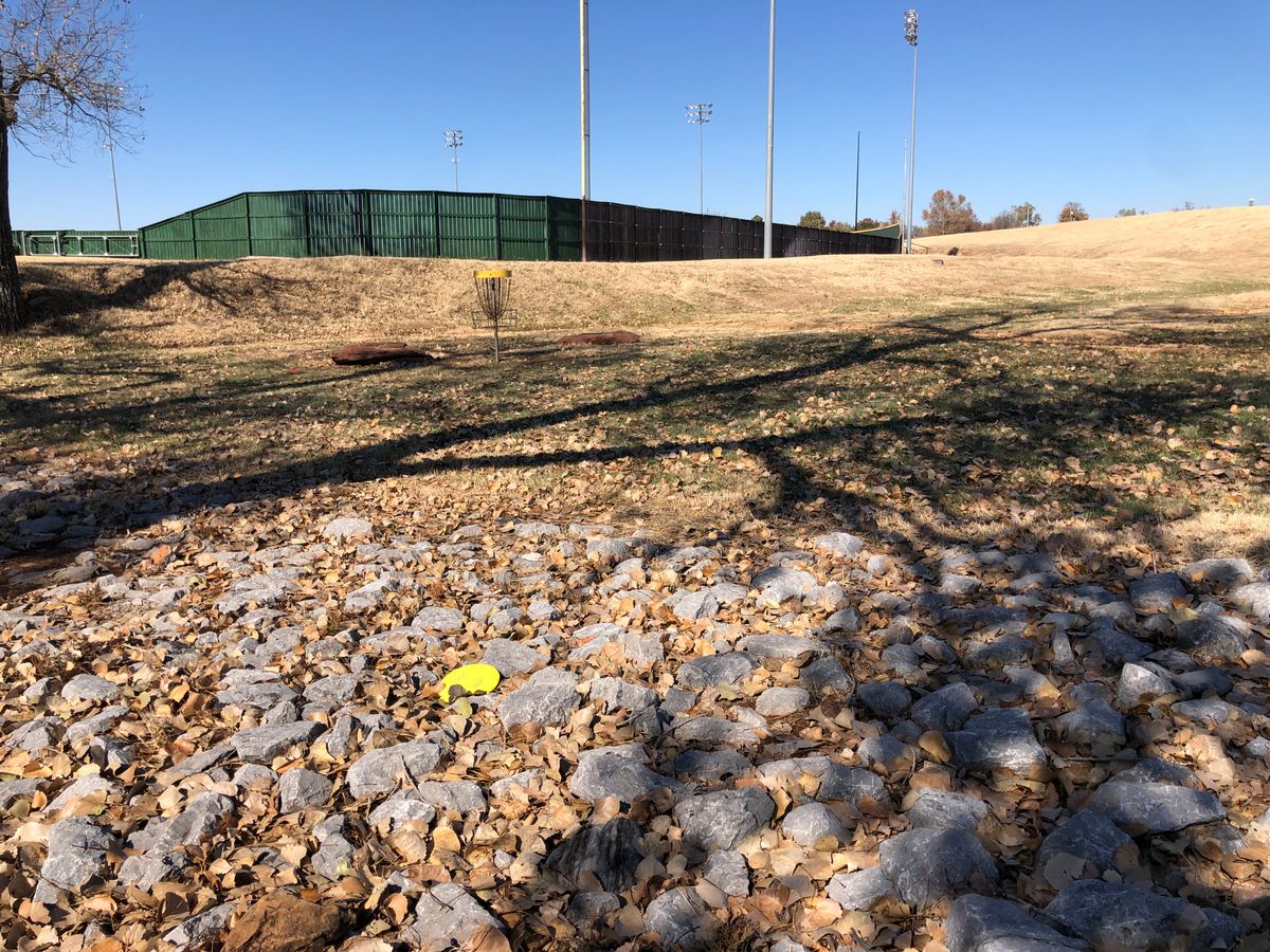 Hole #5 in the rock hazard 45 feet beyond the basket.