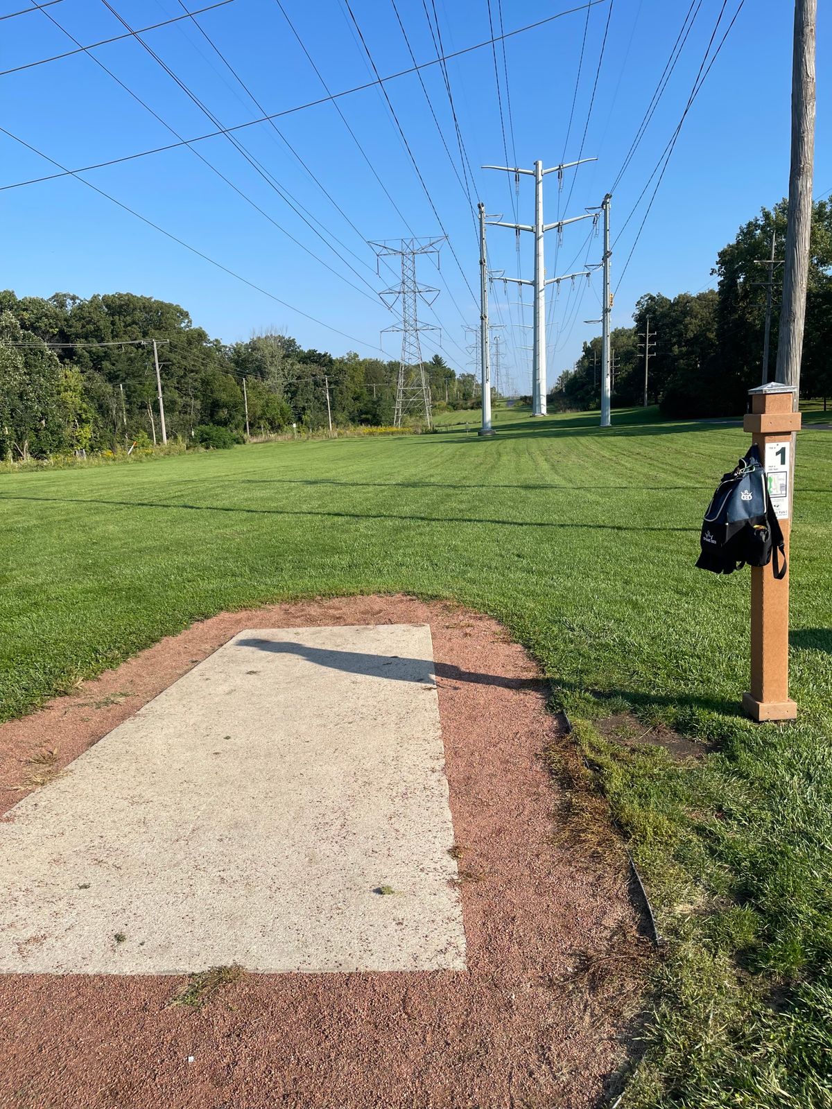 Hole 1, under the power lines.
