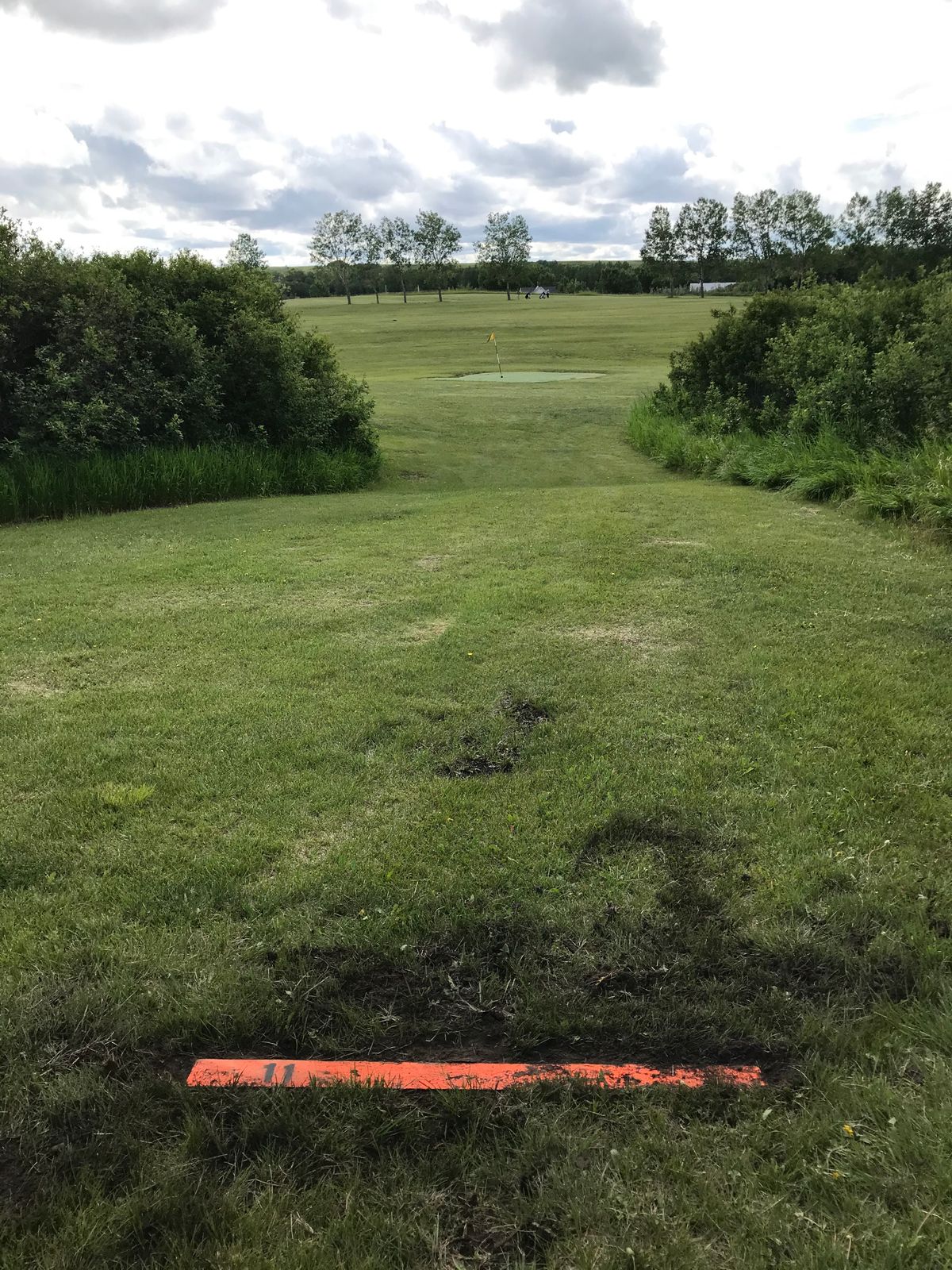 Hole 11. Dog leg left past the green.