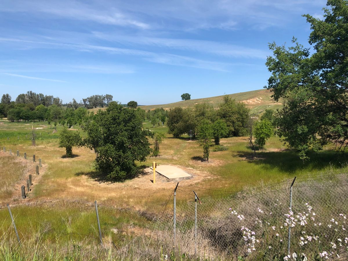 View from hwy 16 where I parked my car, walk to the course from the hwy, the fence is down,m