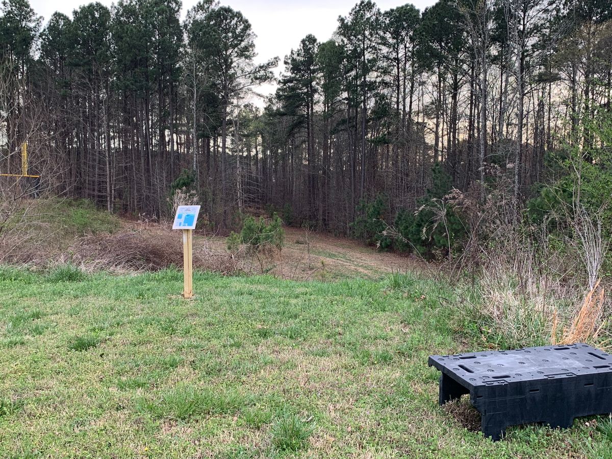 White Tee Box and Sign