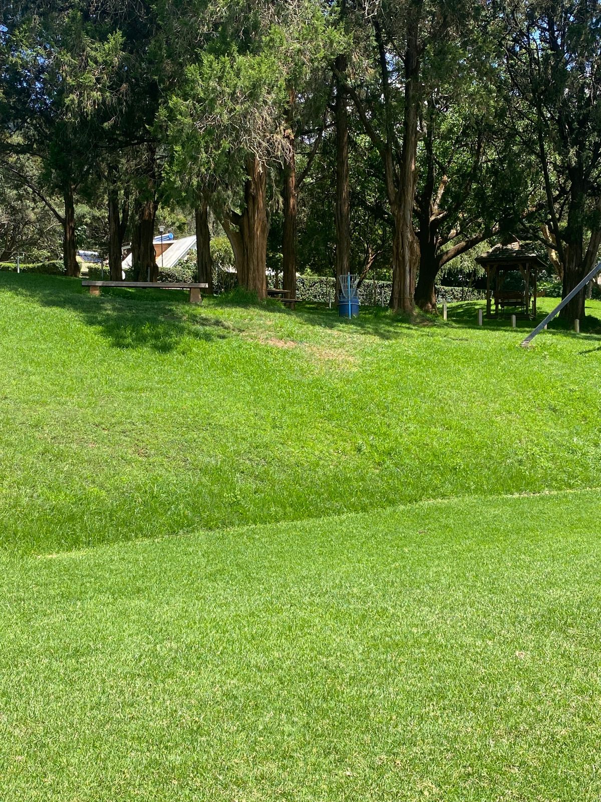Target of hole 2 (dark blue trash can)