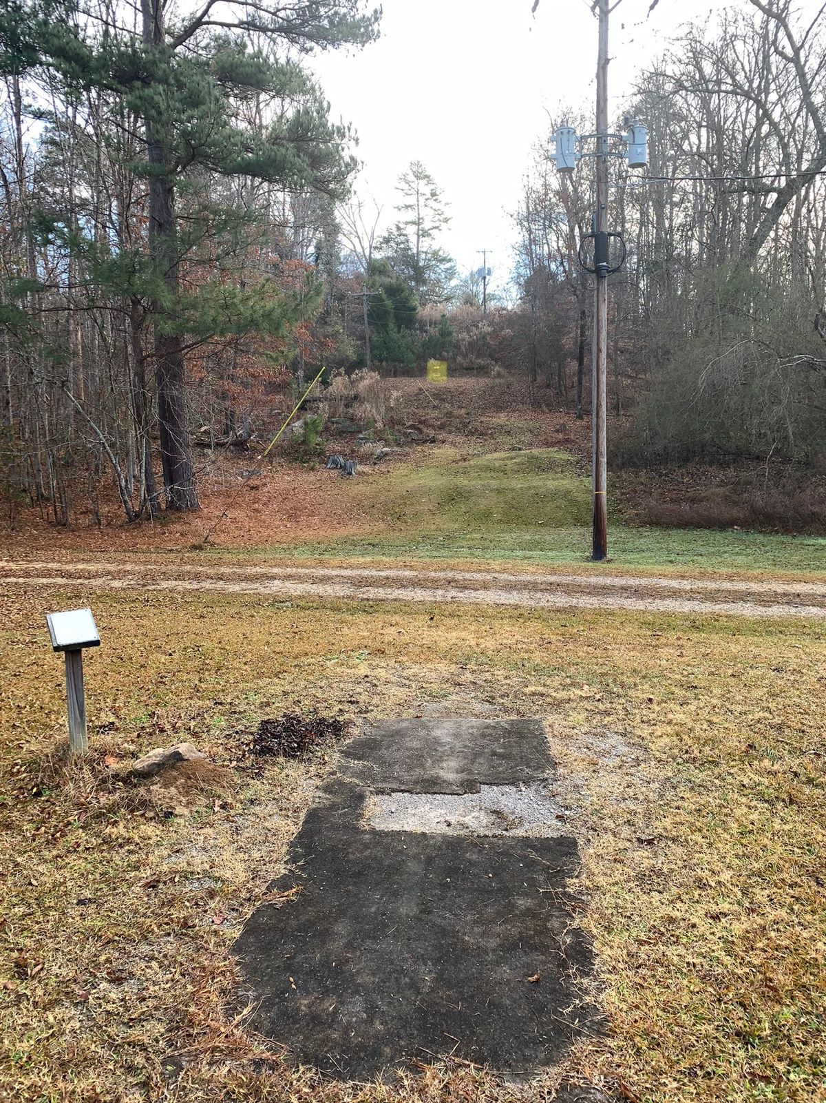 Hole 15 uphill, basket highlighted