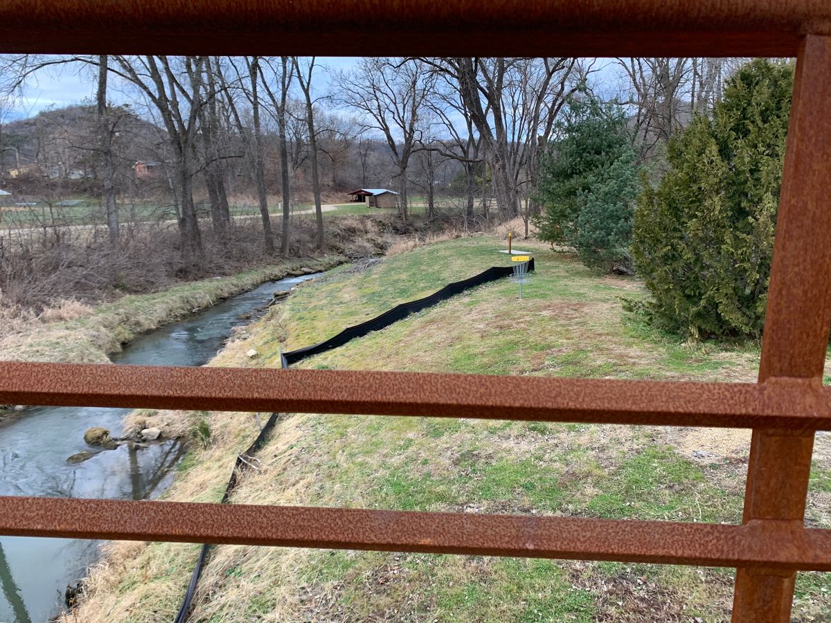 View from bridge looking at hole 7’s basket.