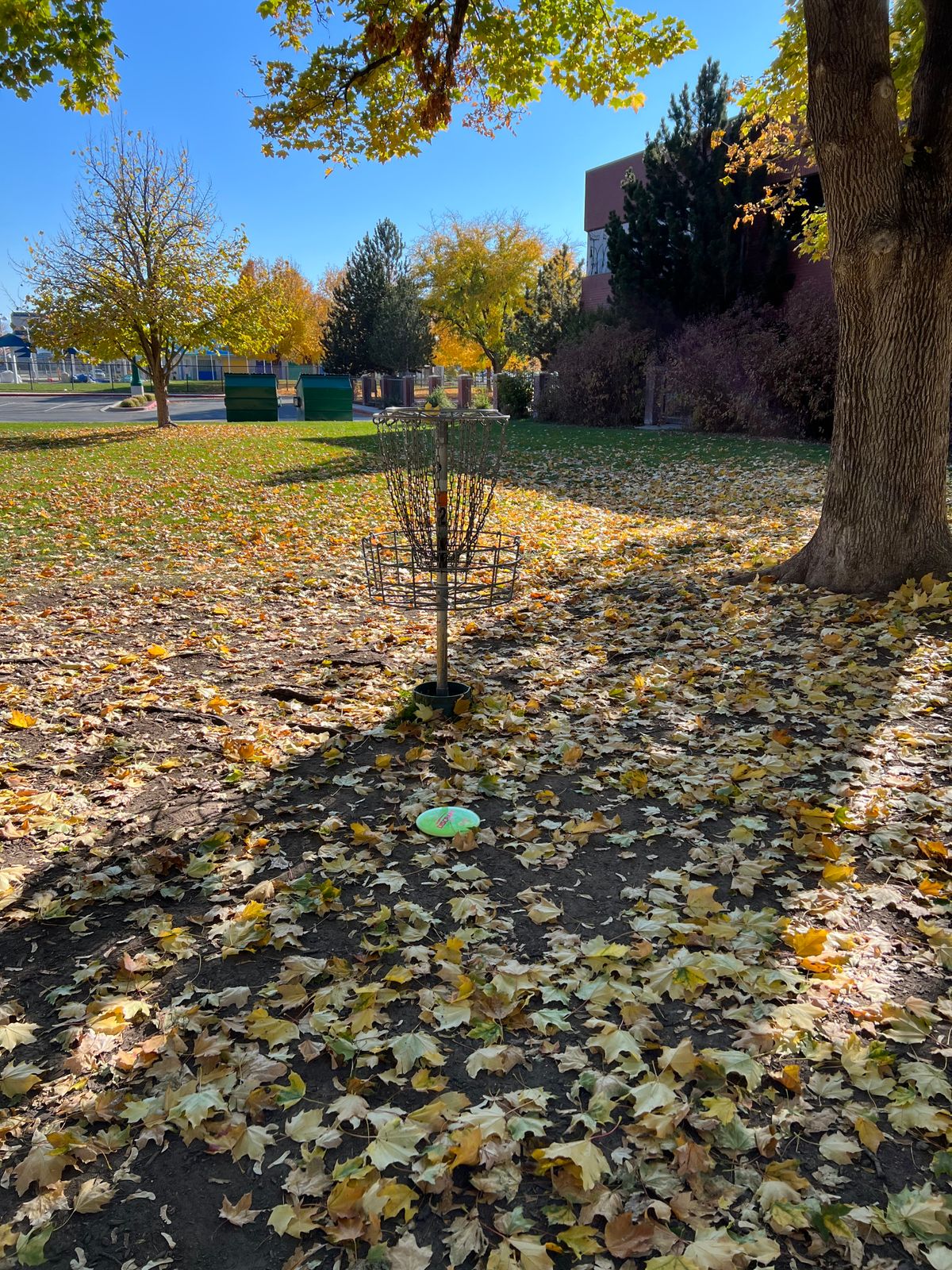 Hole 2 facing parking lot by the pool.