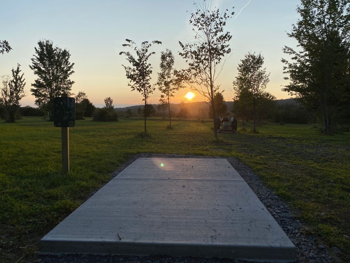 Hole 6 new white tee pad and sign