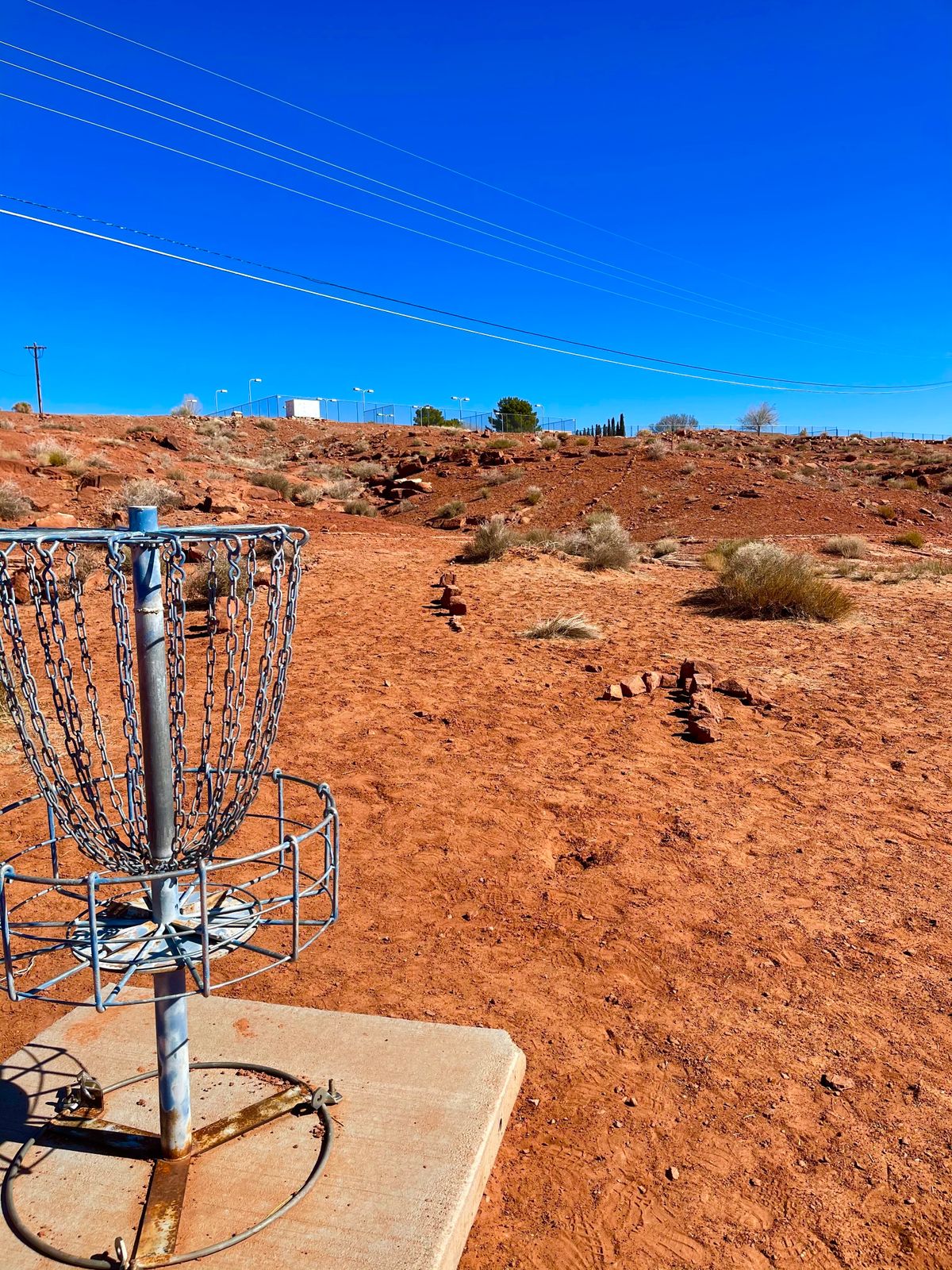 Basket 7. Follow the arrow/ rock path to tee box 8.
