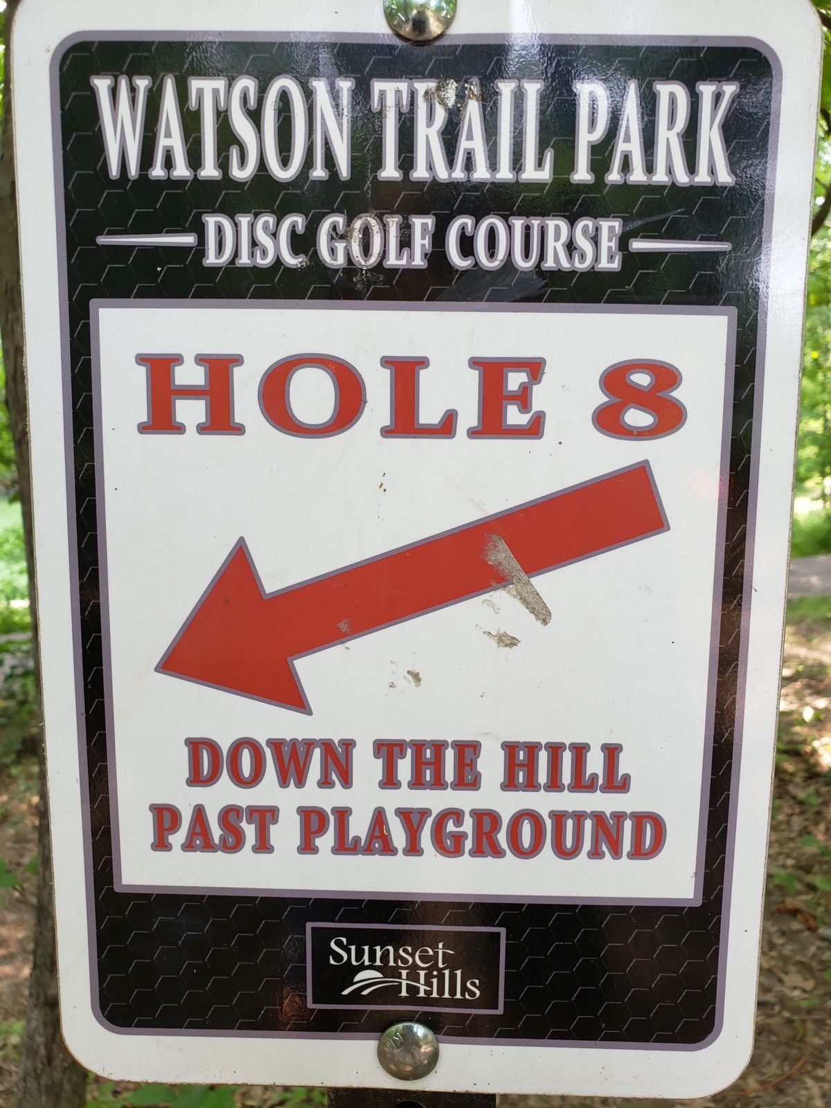 #8 Directional sign,  Tee-Pad directly behind playground.