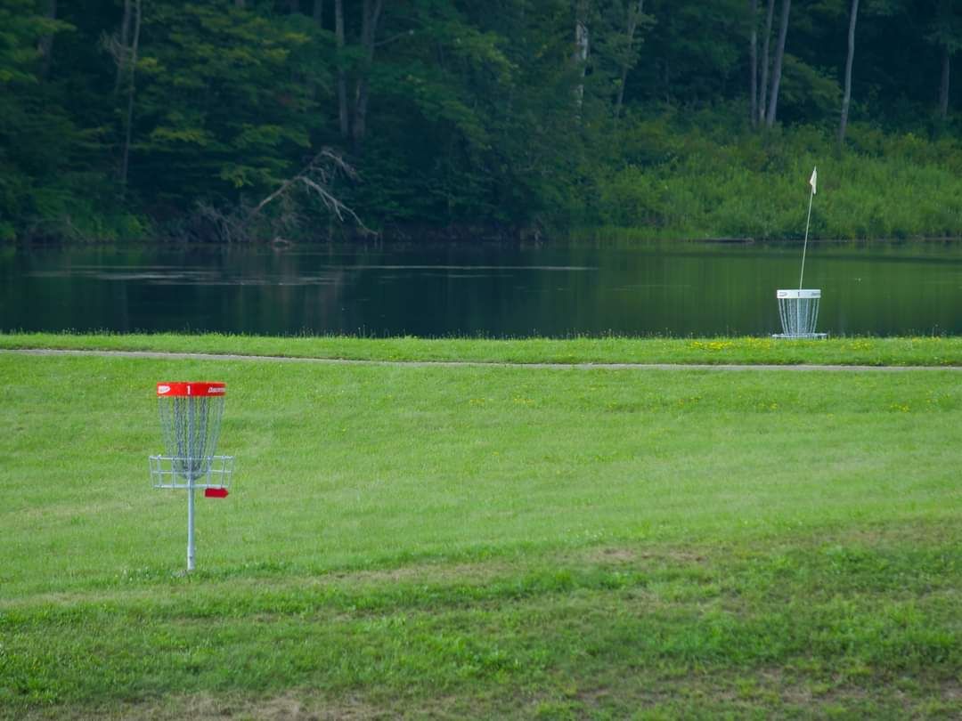 Hole 1 short and long green, with Hope Lake as the backdrop