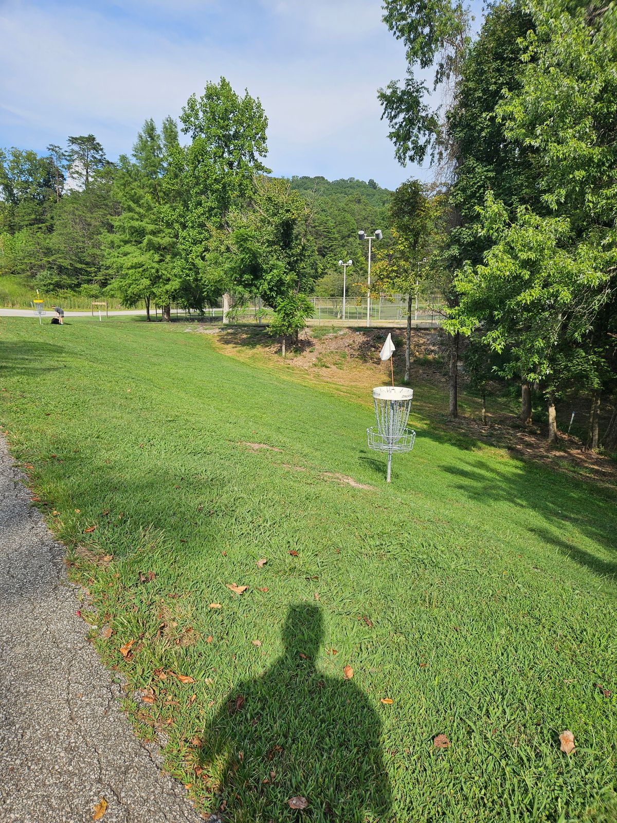 Hole 13 Long Basket. Note: On or Accross Road is OB.