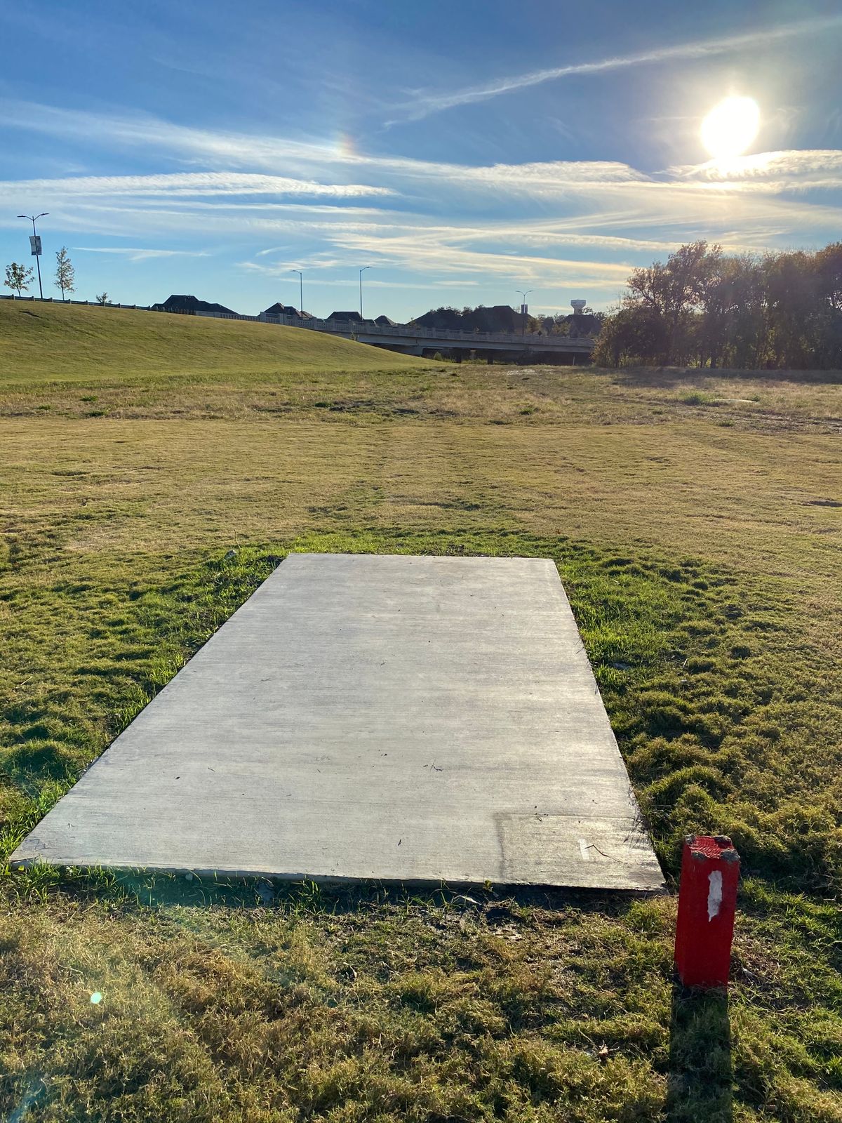 Hole 1 by the playground at the end of the parking lot