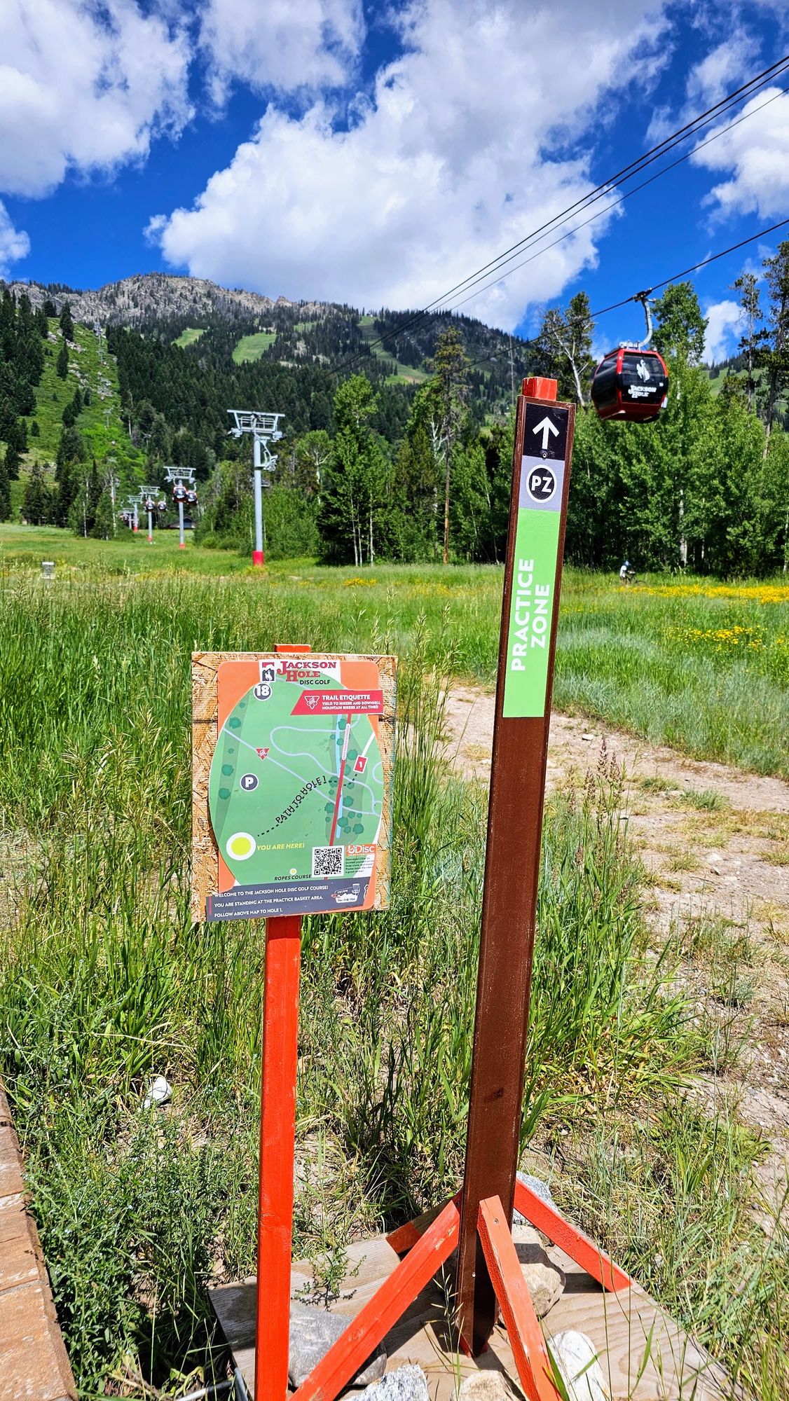 Description and layout of practice basket area heading towards tee 1. 