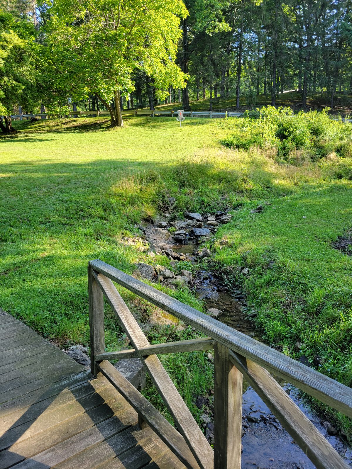 Hole 5: pretty bridge and walk