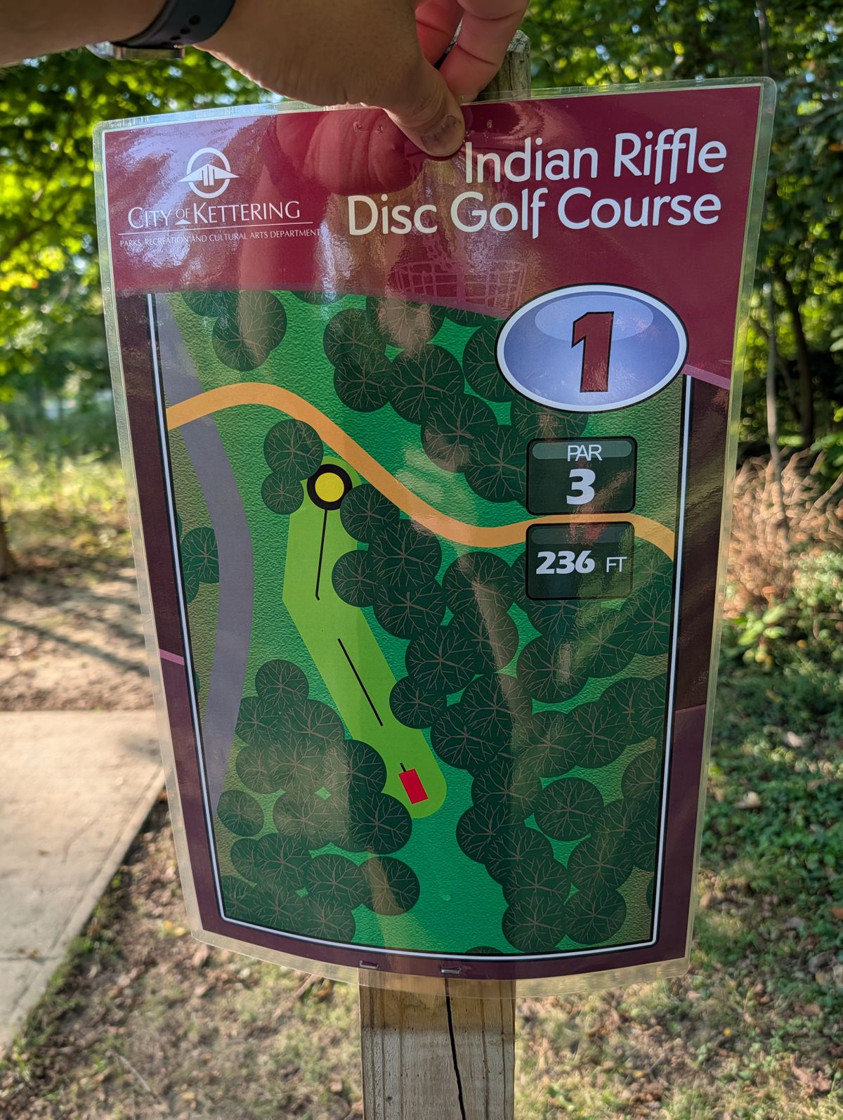 New hole one sign.