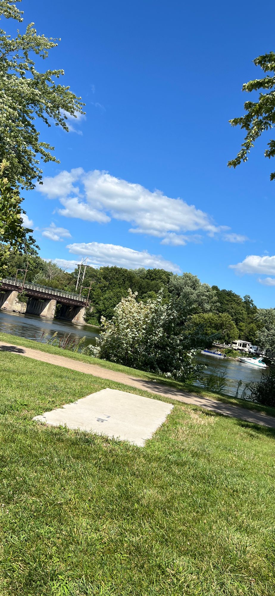 Hole 9 (long) Tee pad with river flow back drop