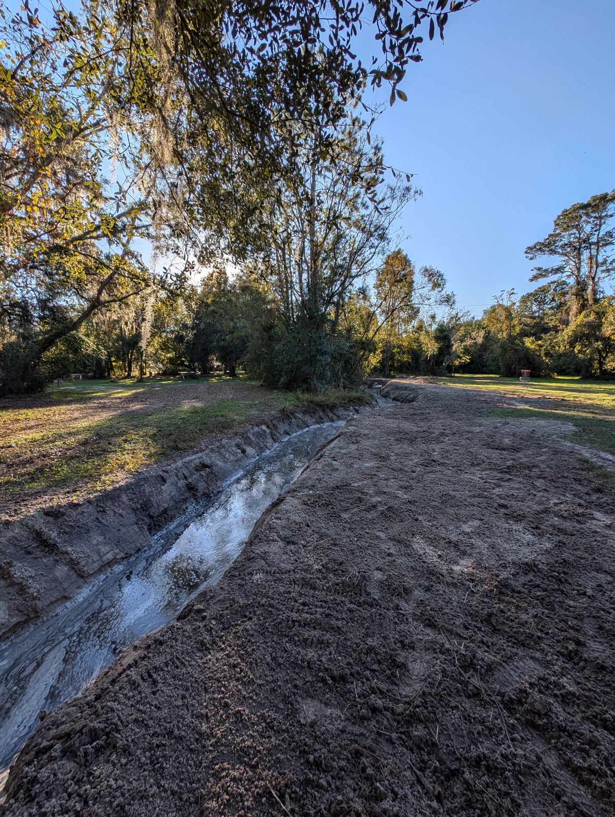 New water river running through Hole 2-4. This is standing in 4s fairway. You can see hole 2s basket.